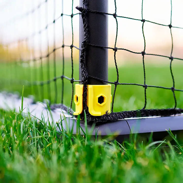 Reinforced corner with yellow lock joint on backyard soccer goal for kids